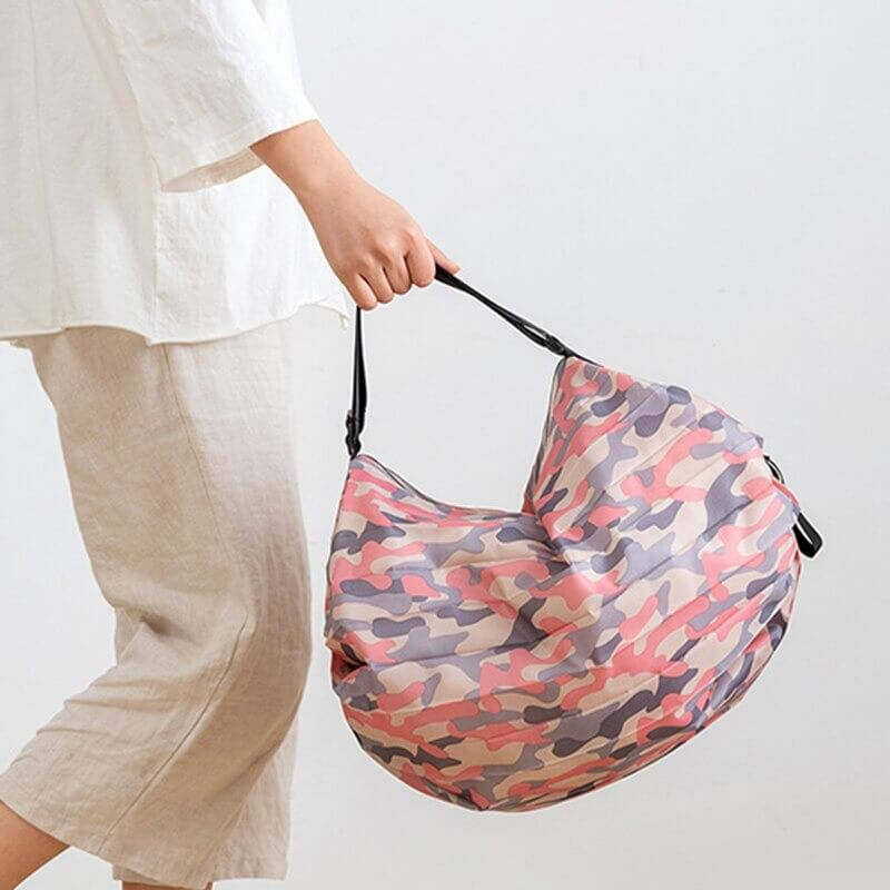 Colorful camo-pattern sports shoulder bag for women, lightweight and waterproof, ideal for fitness and beach days.